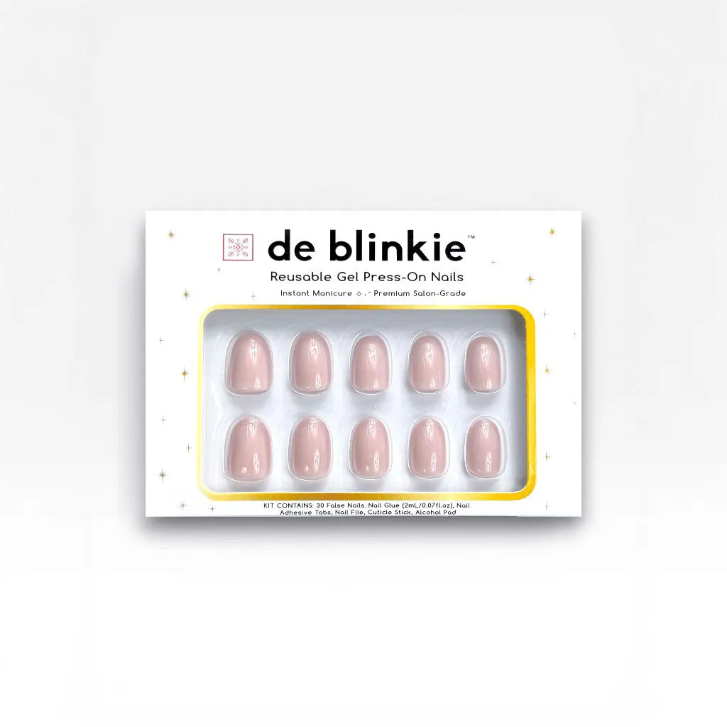 Product box shot showing de blinkie Bare Elegance soft pastel pink nude high gloss short oval press-on nails against white background